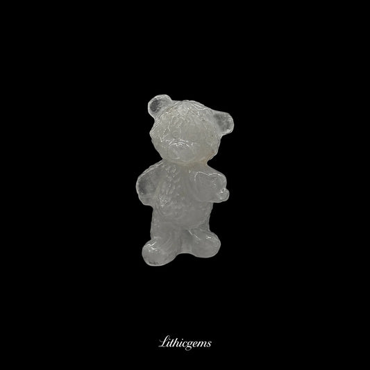 Clear crystal bear figurine on black background, premium Lithicgems gemstone display