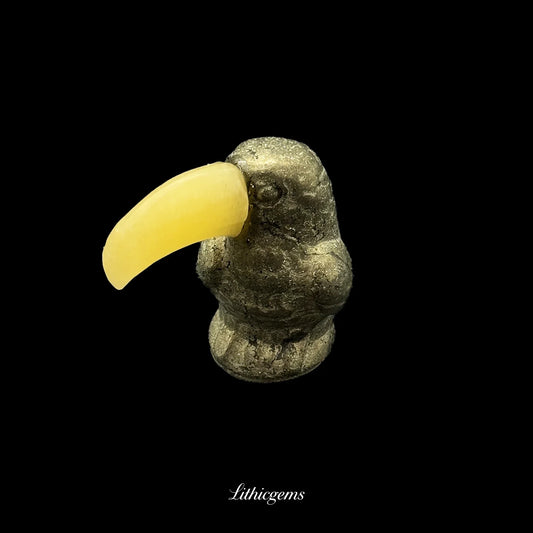 Natural crystal toucan figurine with yellow gemstone beak on black, Lithicgems boutique