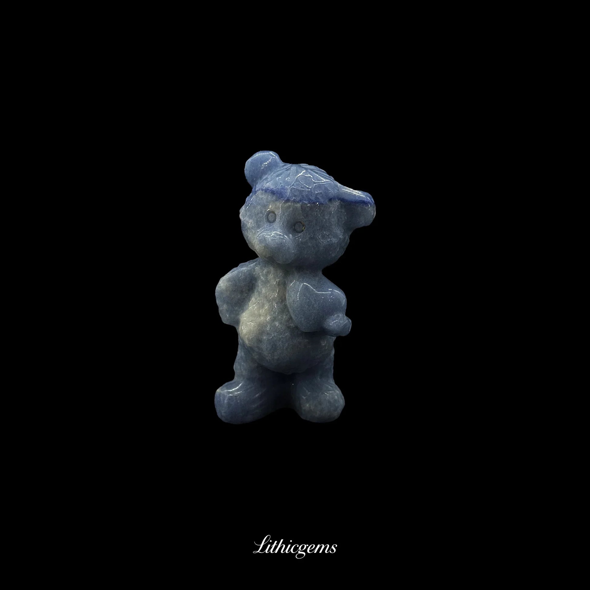 Blue crystal bear figurine from Lithicgems on black background