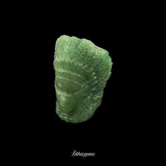 Green natural gemstone carving in feathered headdress on black background, Lithicgems