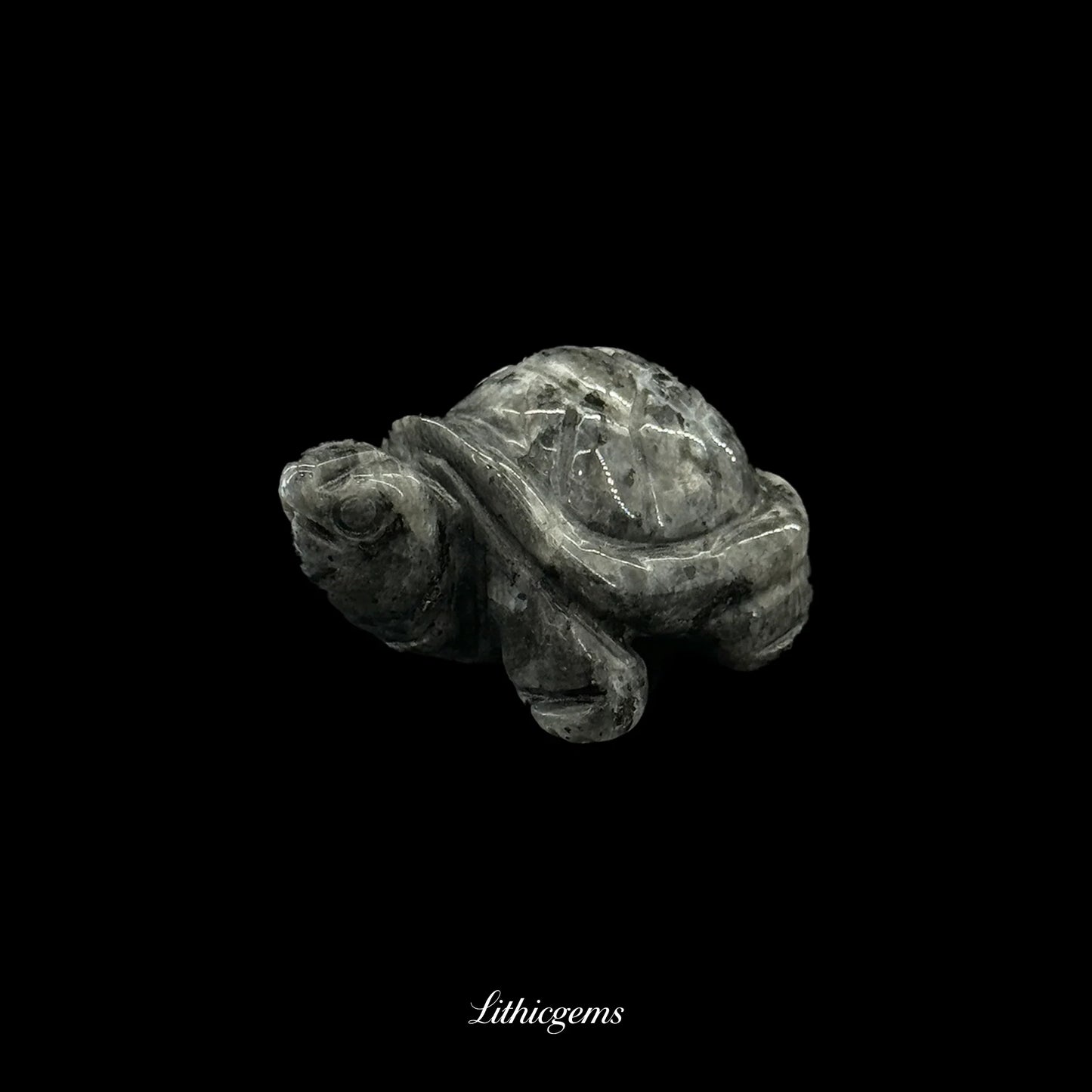 Grey crystal turtle figurine, natural gemstone carving on black background, Lithicgems boutique