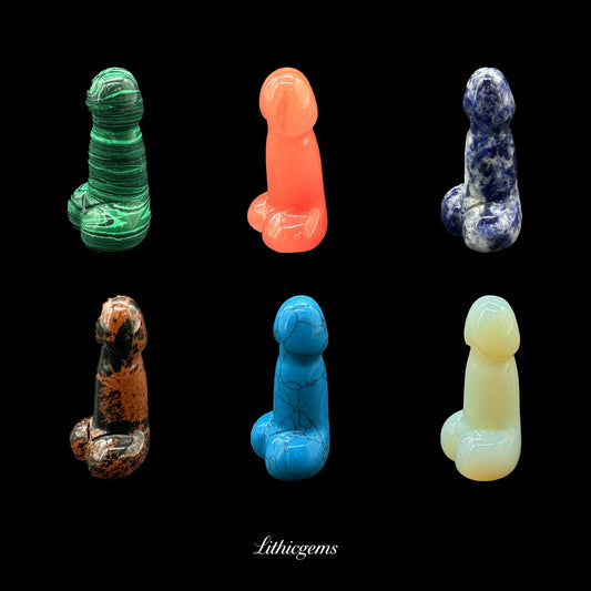 Six natural crystal gemstone carvings in assorted colors from Lithicgems on black background.