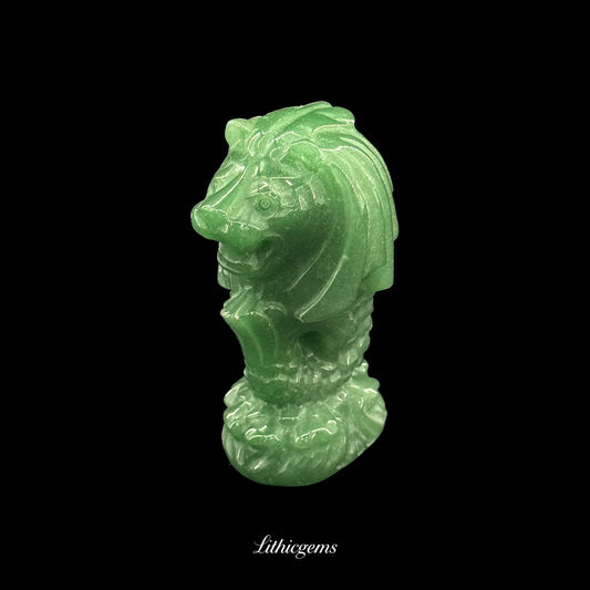 Green crystal Merlion gemstone carving from Lithicgems on black background