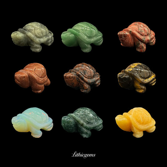Nine assorted crystal gemstone carved turtle figurines on black background, Lithicgems