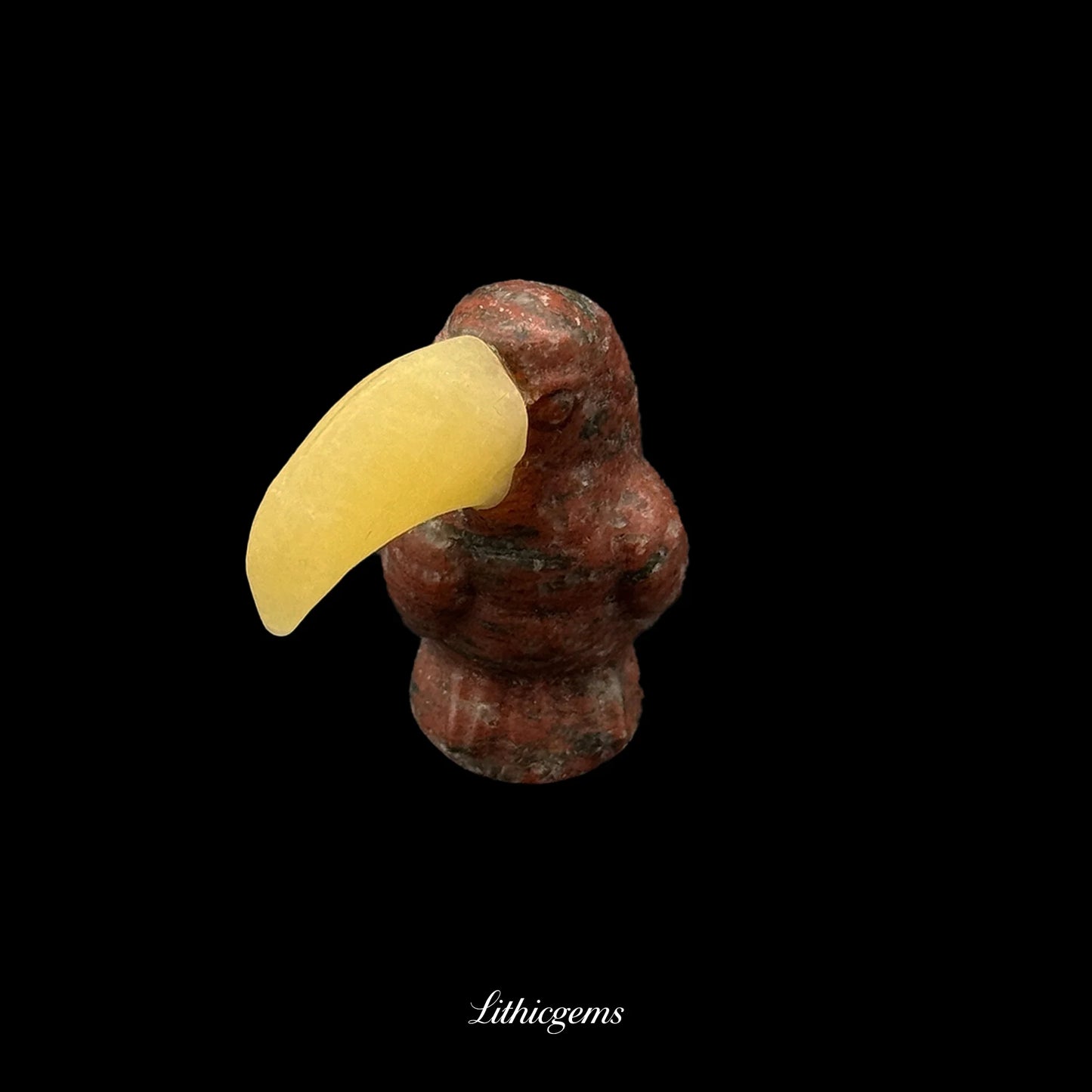 Hand-carved gemstone bird with yellow beak, premium crystal decor by Lithicgems