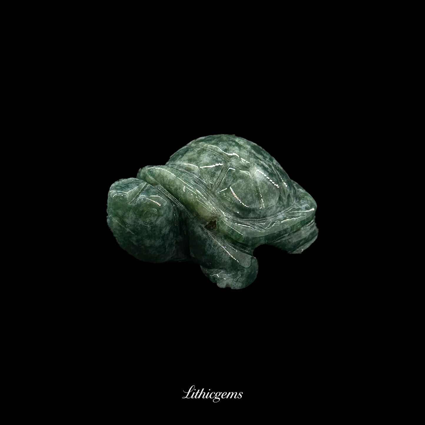 Green crystal turtle figurine, natural gemstone carving on black background, Lithicgems boutique